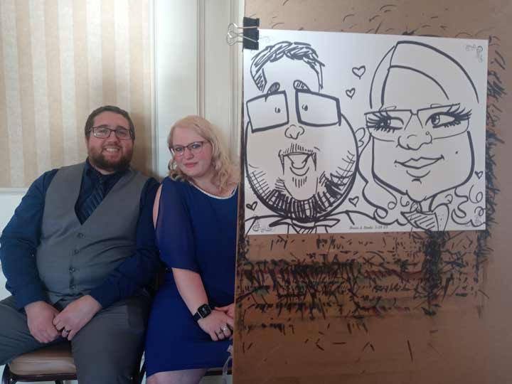 Guests of Linda and Bruce enjoy a day of celebration and caricatures in May 2023 in Laconia, NH.